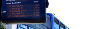 LED Bus stop display with bus in background