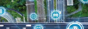Overhead view of roads and rail with digital icons overlaid