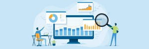 graphs and charts on computer screen with two people looking at them